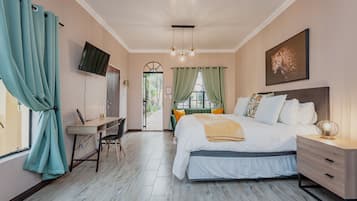 Premium Room | 1 bedroom, premium bedding, in-room safe, individually decorated