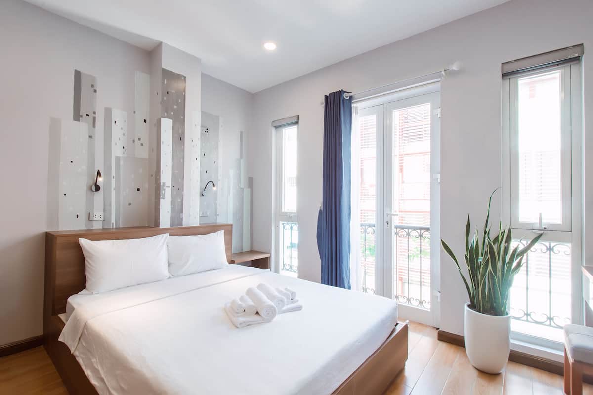 Camera doppia, angolo cottura | 1 camera, biancheria da letto di alta qualità, minibar
