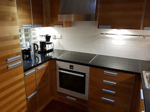 Deluxe Apartment (with Sauna and Balcony) | Private kitchen | Full-size fridge, oven, stovetop, dishwasher - 2ndhomes Deluxe Kamppi Center Apartment with Sauna & Balcony (Helsinki)
