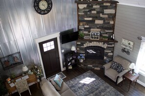 Smart TV, fireplace, DVD player, books