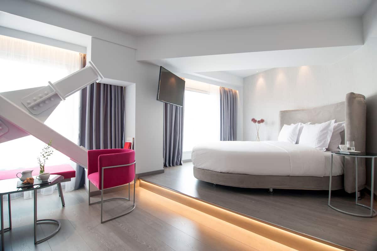 Superior Double Room | Minibar, in-room safe, desk, blackout drapes