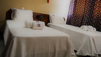 Twin Room, City View | Minibar, desk, laptop workspace, blackout drapes