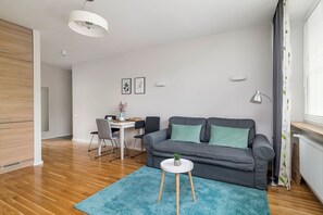 Apartamento superior | Sala de estar | TV de tela plana