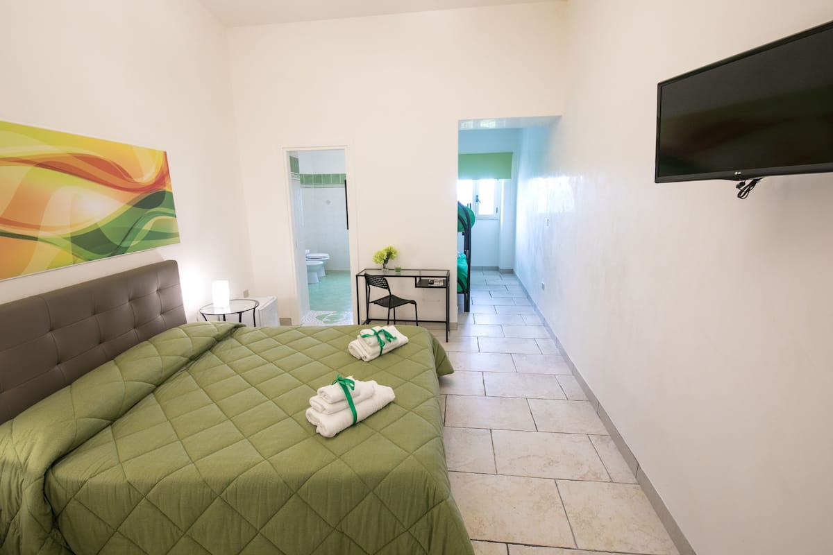 Quadruple Room, Multiple Beds | In-room safe, desk, WiFi (free), bed sheets