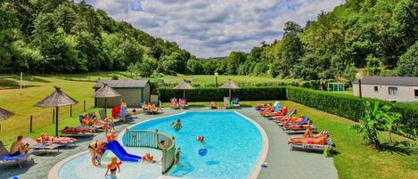 Seasonal outdoor pool, open 10:30 AM to 8:00 PM, pool umbrellas