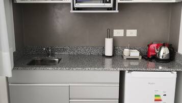 Standard Double Room, 1 Queen Bed, City View | Private kitchen | Full-size fridge, oven, stovetop, electric kettle