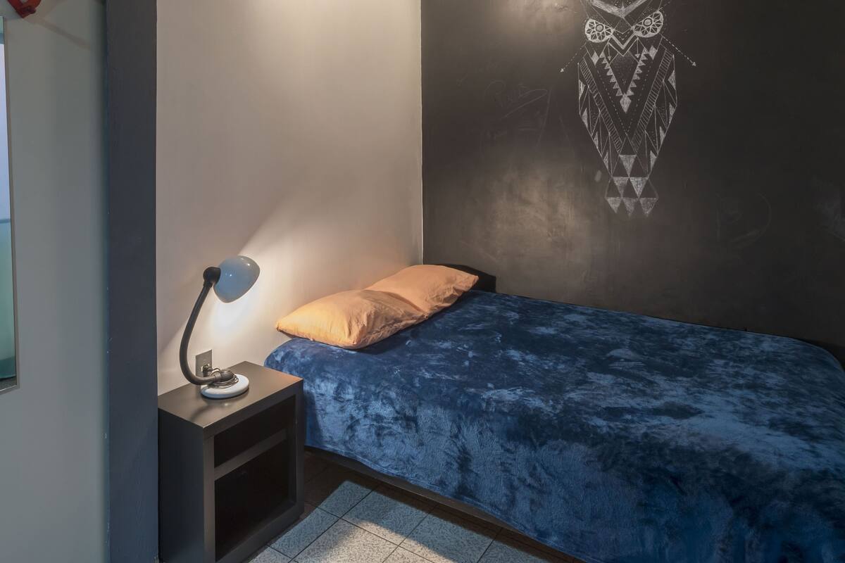 Economy Room | Down comforters, desk, laptop workspace, blackout drapes