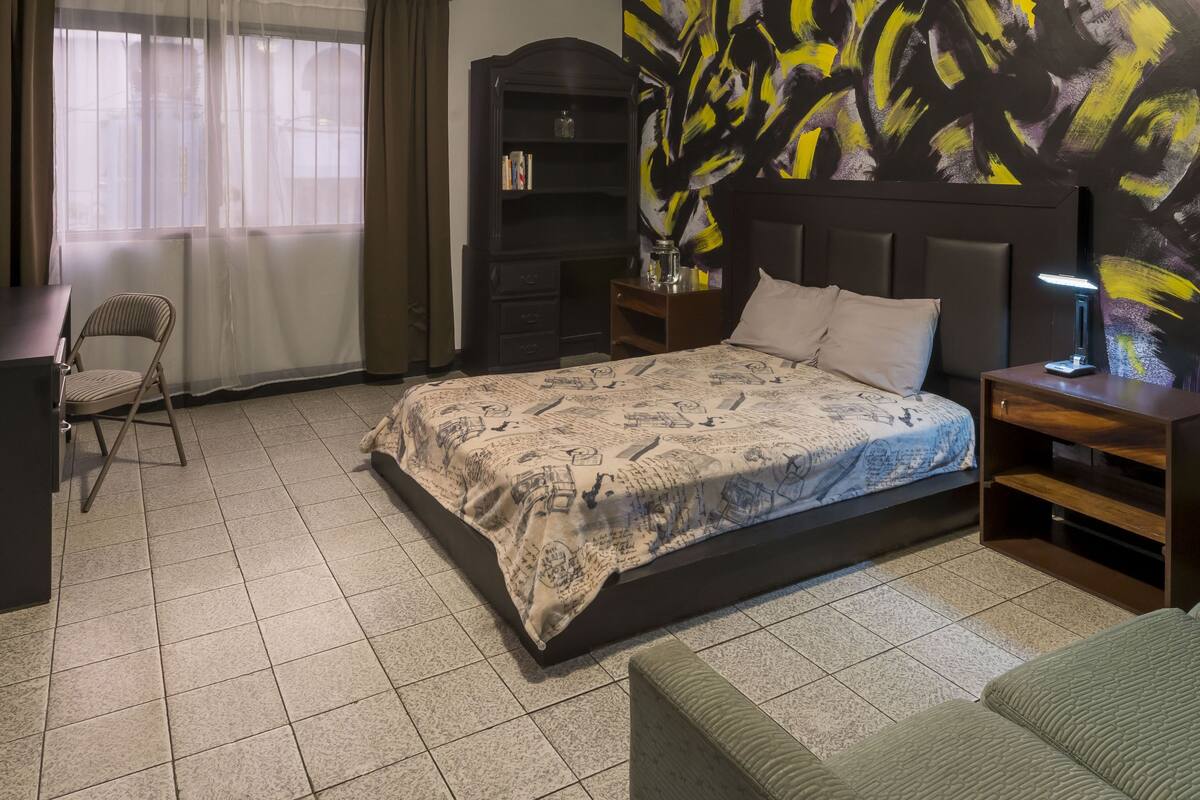 Economy Room | Down comforters, desk, laptop workspace, blackout drapes