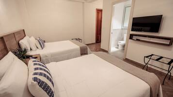 Quarto quádruplo conforto | Roupas de cama premium, individualmente decorados