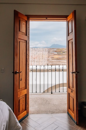 Habitación cuádruple Confort | Ropa de cama de alta calidad y decoración individual