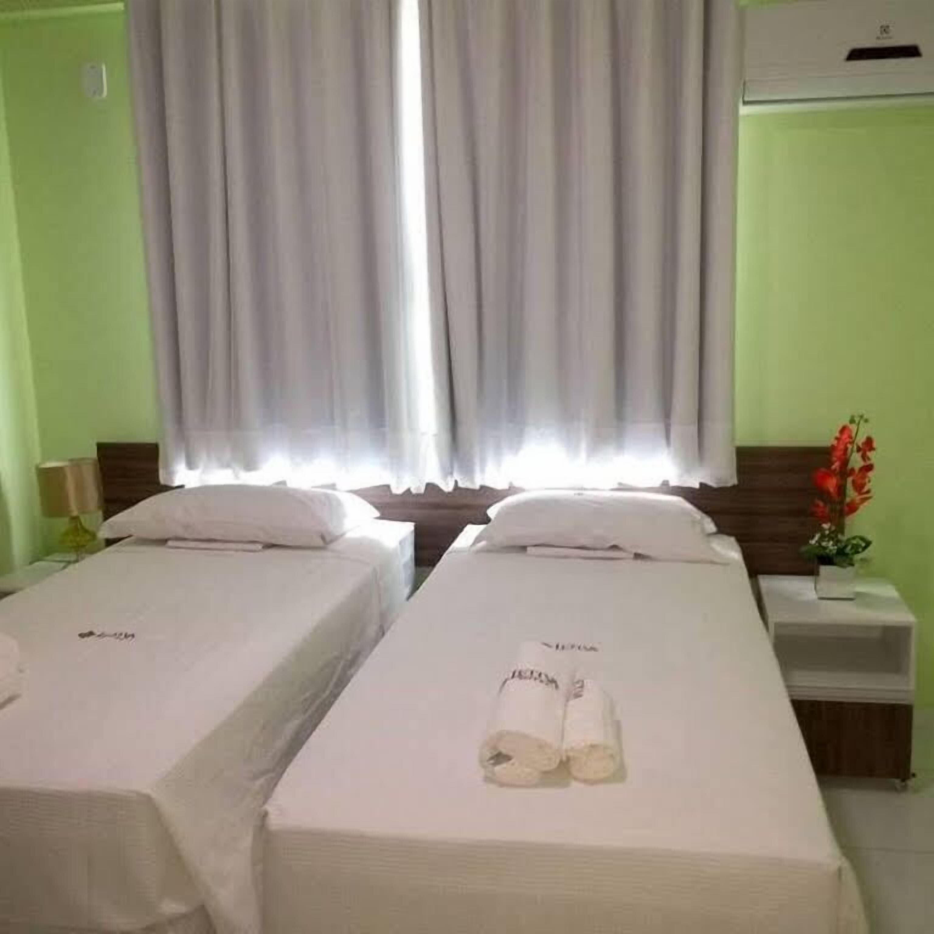 Minibar, desk, blackout drapes, iron/ironing board