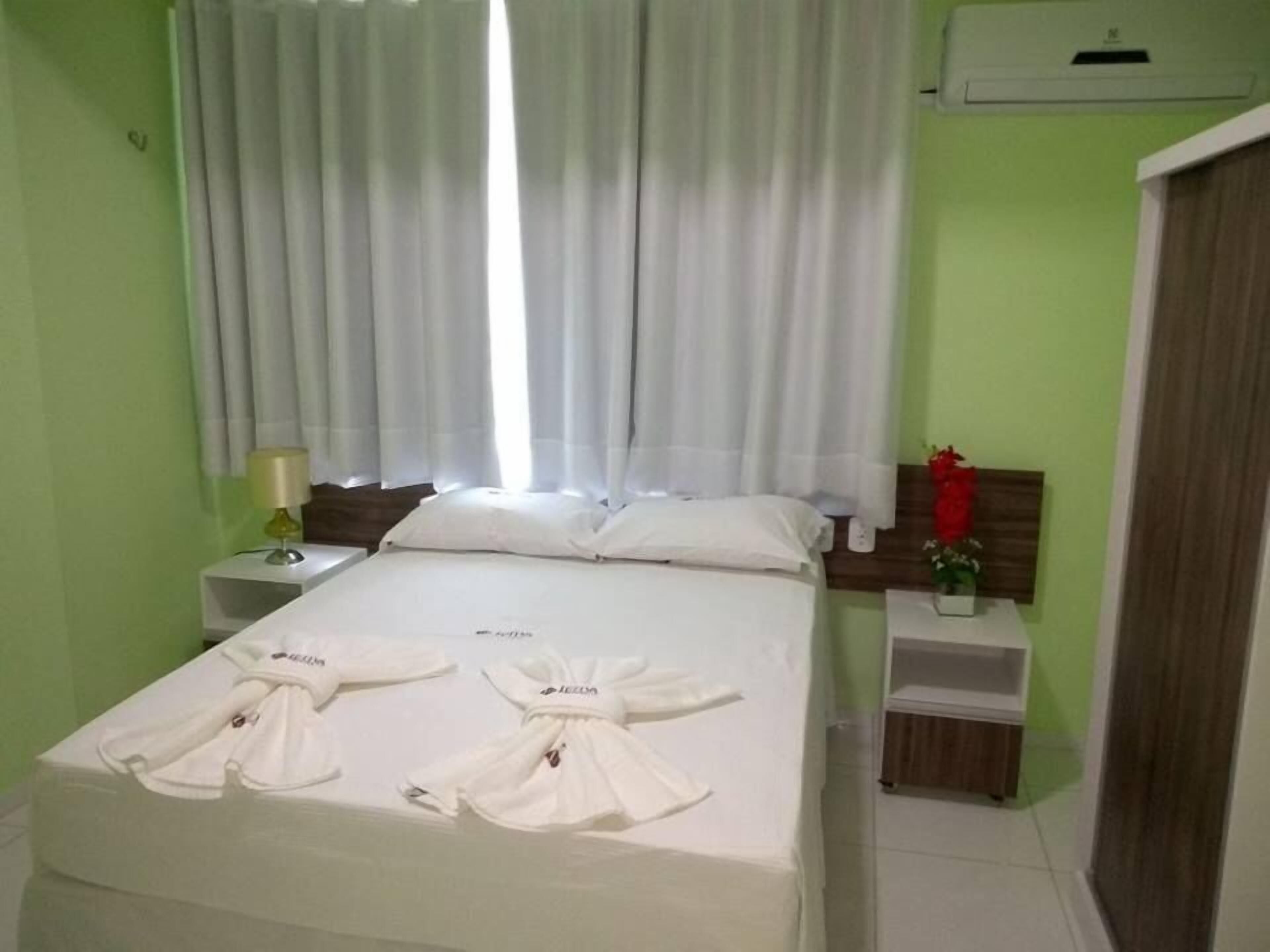 Minibar, desk, blackout drapes, iron/ironing board