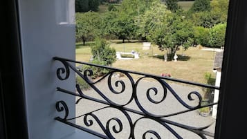 Family Triple Room, Garden View | Garden view
