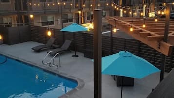 Seasonal outdoor pool, pool umbrellas, pool loungers