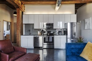 Apartment, 2 Bedrooms, Non Smoking | Living area | 65-inch LED TV with cable channels, TV, Netflix - Deedee's Industrial Lofts (Jersey City)