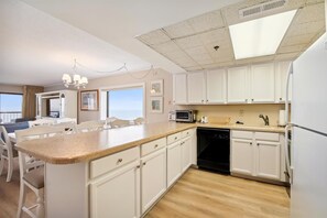 Microwave, dishwasher, coffee/tea maker, toaster - XPLORIE ACTIVITIES & LINENS INCLUDED*! SUNDAY-SUNDAY Direct oceanfront, 3BR/2BA south end unit. Beautifully furnished with ceramic tile floors throughout. (Ocean City)