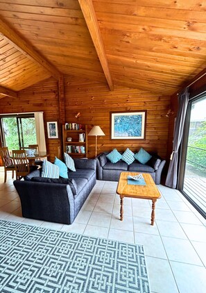 Family House, Garden View | Living area | Flat-screen TV, DVD player