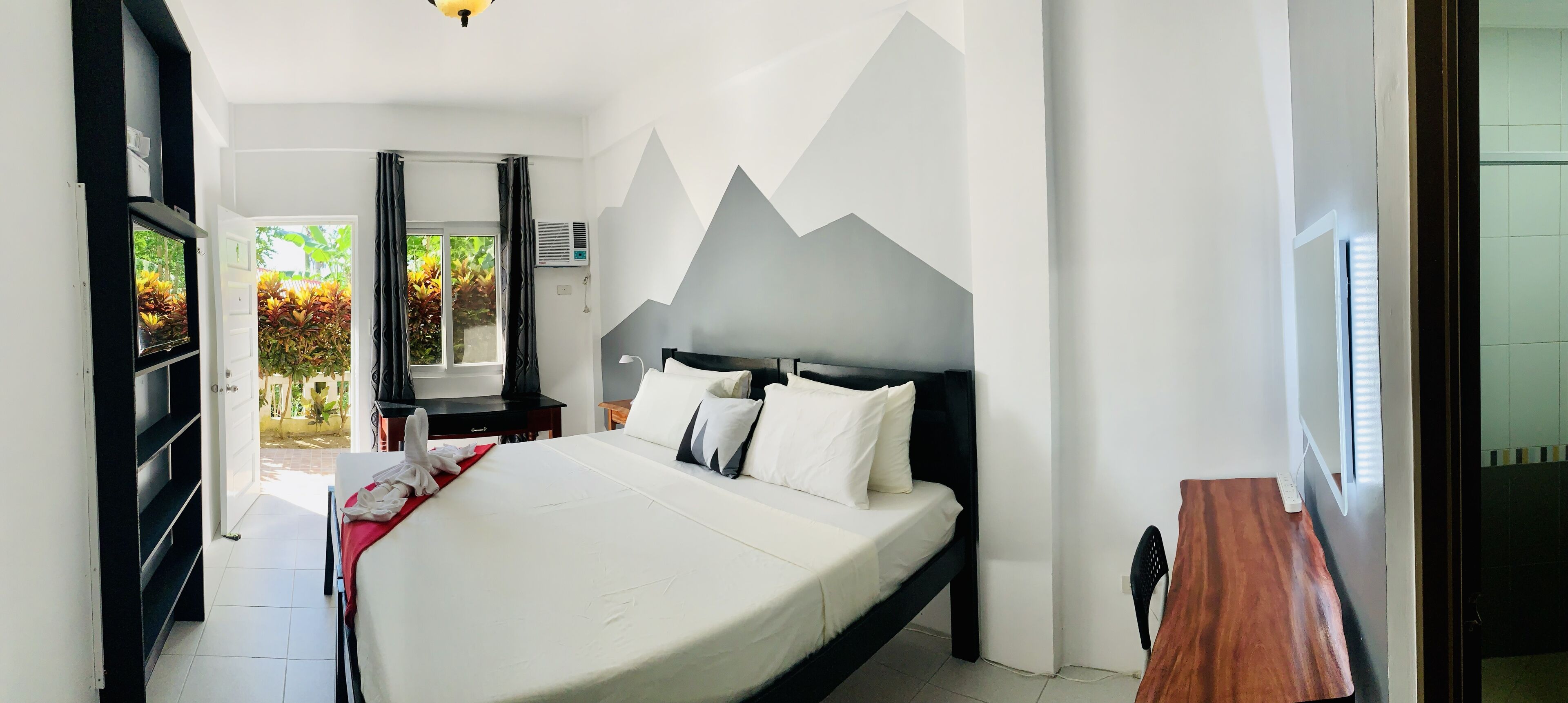 Desk, blackout drapes, soundproofing, rollaway beds