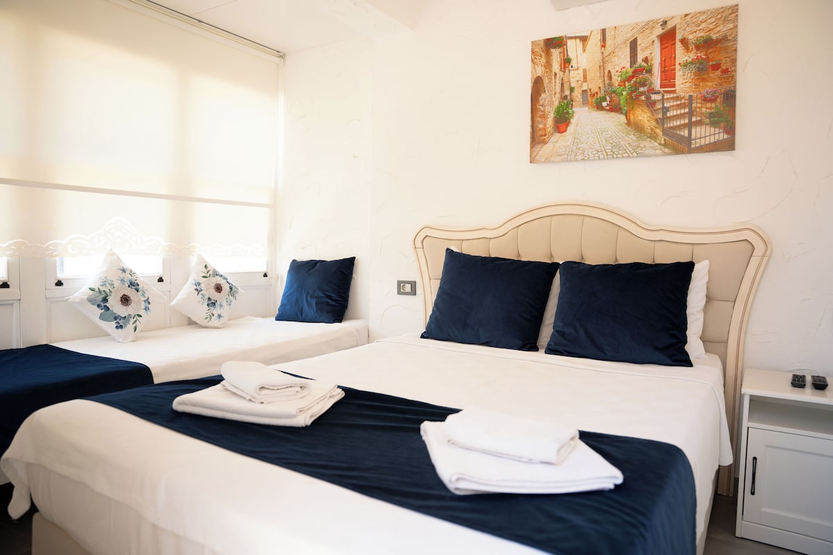Triple Room, Pool View (Aquila) | Premium bedding, minibar, soundproofing, iron/ironing board (on request)