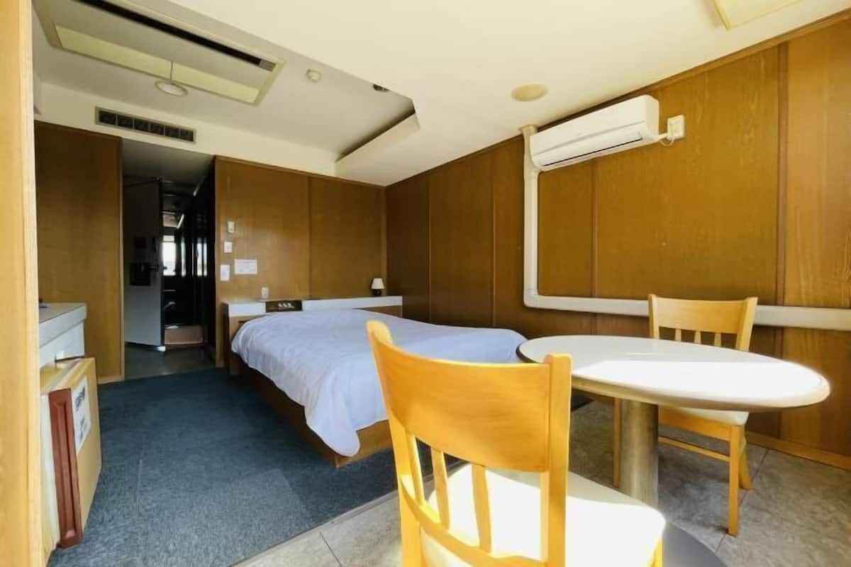 Desk, blackout curtains, free WiFi, bed sheets