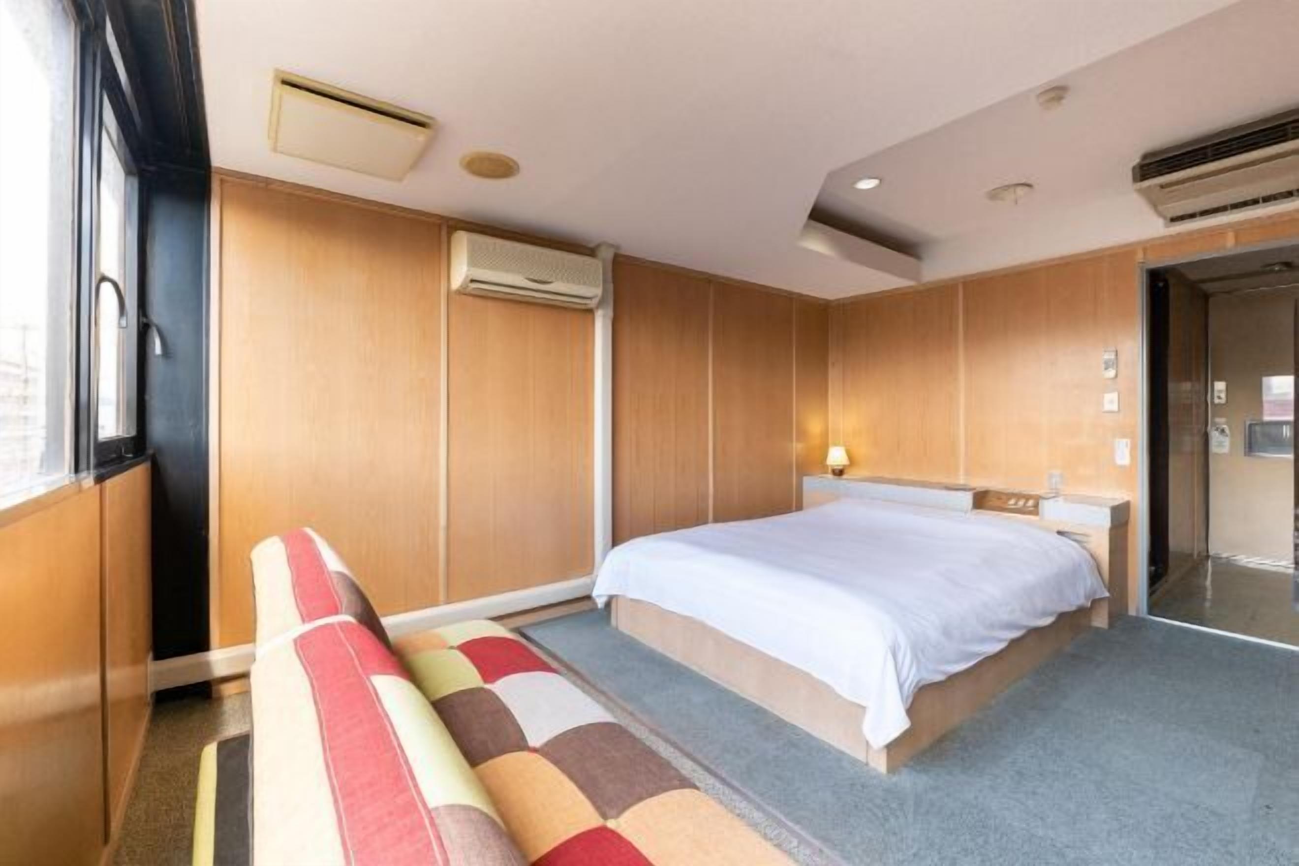 Desk, blackout curtains, free WiFi, bed sheets