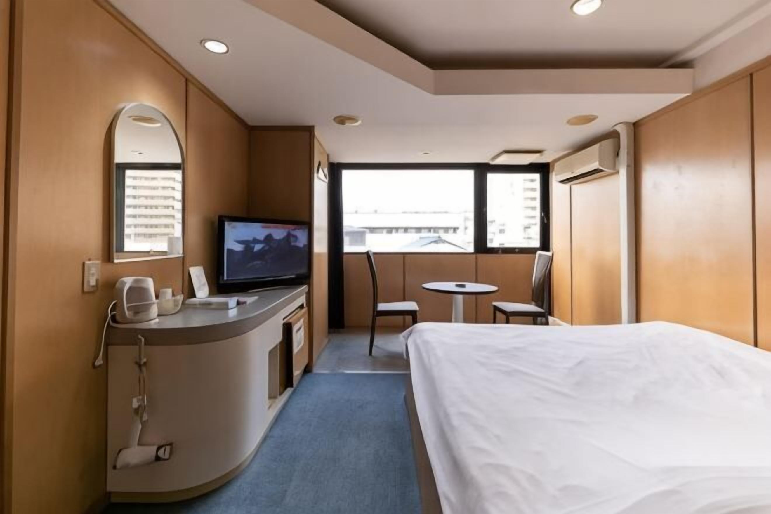 Desk, blackout curtains, free WiFi, bed sheets