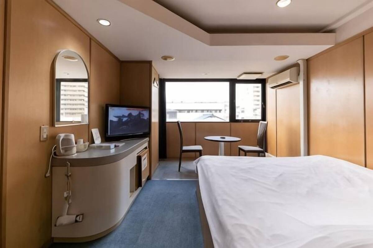 Desk, blackout curtains, free WiFi, bed sheets