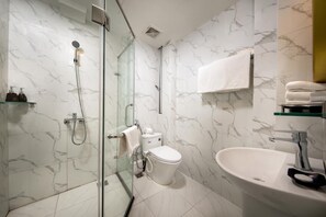 Shower, free toiletries, hair dryer, slippers
