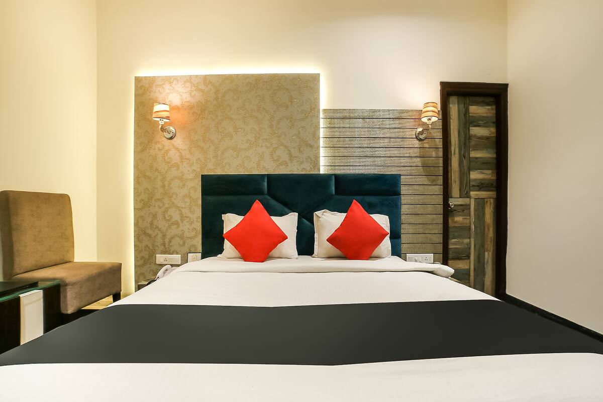 Habitación Deluxe | Ropa de cama de alta calidad y wifi gratis 
