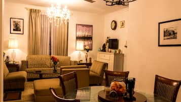 Double or Twin Room | Living area | TV