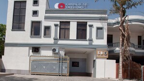 A modern building with a sign reading "Capital O SB Excellence". - Capital O 30351 S B Excellency (Jodhpur)