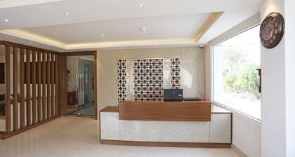 Capital O 36733 Hotel Surya Grand