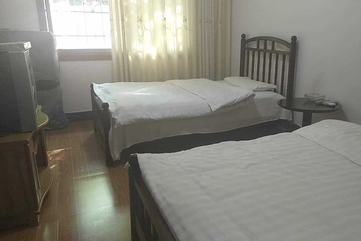 Twin Room, Non Smoking | Blackout drapes, free WiFi, bed sheets