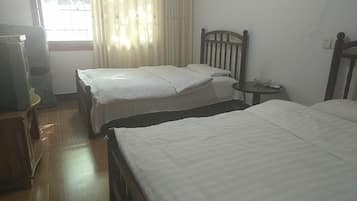 Twin Room, Non Smoking | Blackout drapes, free WiFi, bed sheets