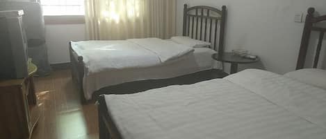 Twin Room, Non Smoking | Blackout curtains, free WiFi, bed sheets