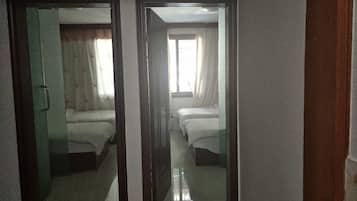 Twin Room, Non Smoking | Blackout curtains, free WiFi, bed sheets