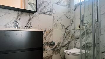 Shower, free toiletries, hair dryer, bathrobes
