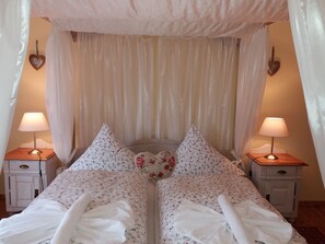 Tabla de planchar con plancha, camas extra, wifi gratis y ropa de cama 