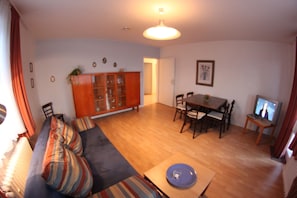 Apartamento (73qm) | Sala de estar | Una televisión