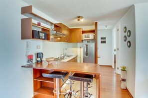 Fridge, microwave, oven, stovetop - Cómodo y Acogedor Departamento-Santiago Centro 22 (Santiago)