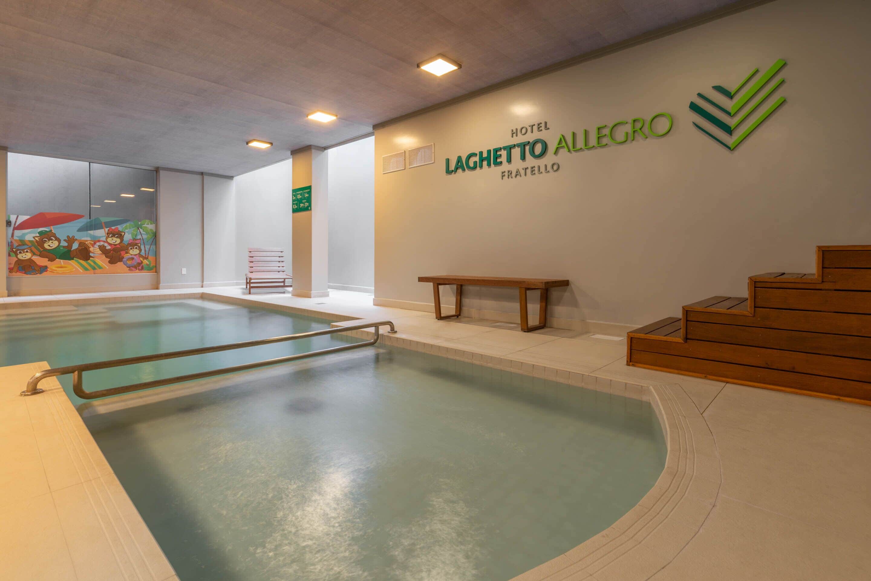 Indoor pool, open 10:00 AM to 10:00 PM, pool loungers