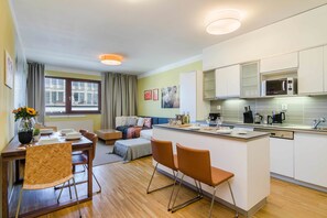 Deluxe Apartment, Garden View | Living area | Smart TV - Luxury Center APT by Michal&Friends (Prague)