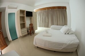 Comfort Triple Room | Minibar, blackout drapes, iron/ironing board, free WiFi