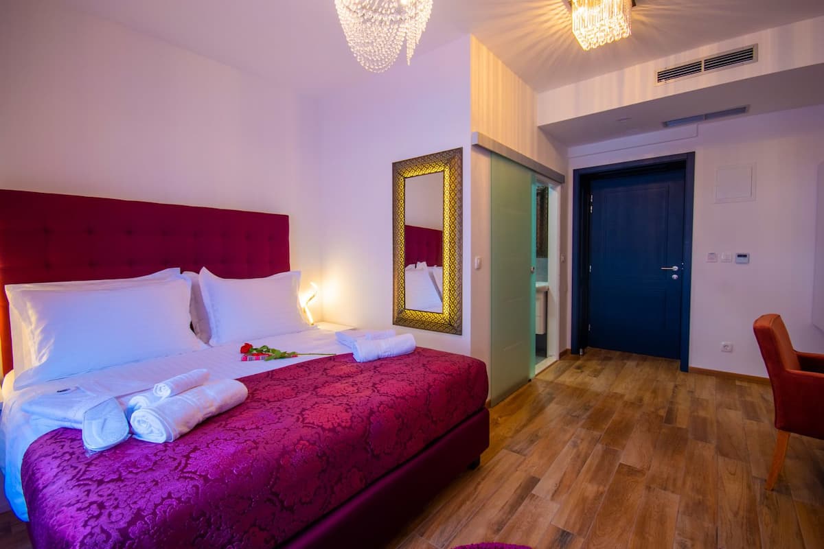 Deluxe Double Room, Private Bathroom (Room 3) | 1 bedroom, minibar, in-room safe, desk