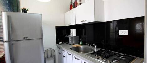 Standard Apartment, 1 Bedroom, City View | Private kitchen | Full-size fridge, microwave, stovetop, electric kettle