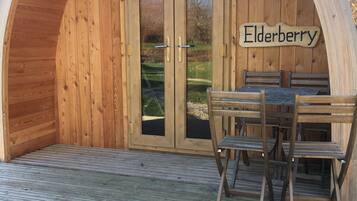 A wooden structure with a sign reading "Elderberry."