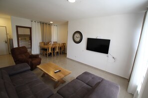 Family Apartment, 3 Bedrooms | Living area | Flat-screen TV - Arendalzrail Apartment - Hertsel St. 4 (Bat Yam)
