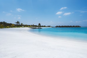 On the beach, white sand, snorkeling, windsurfing