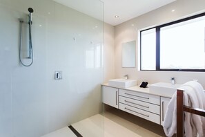 Shower, hair dryer, towels, soap