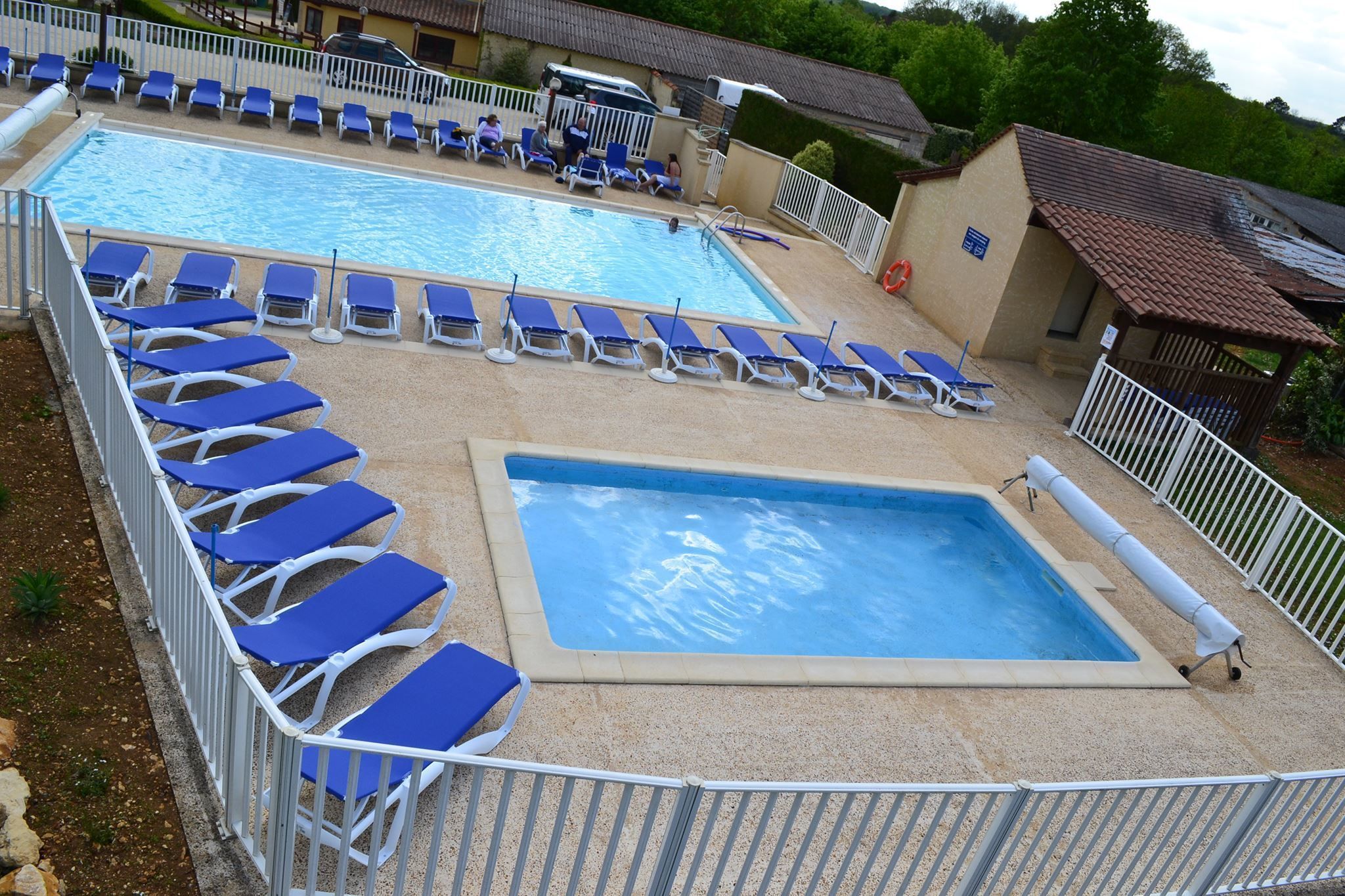 Seasonal outdoor pool, pool umbrellas, pool loungers